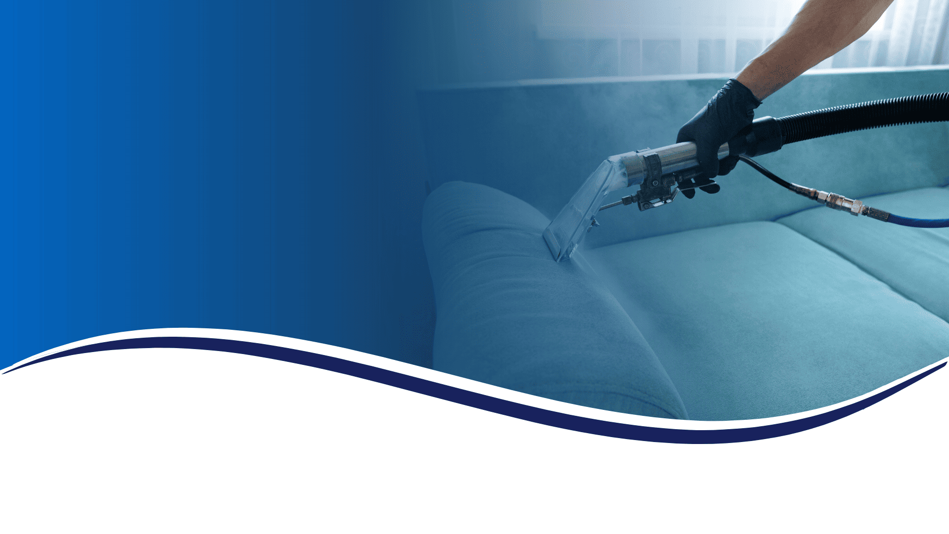 Technician performing professional upholstery cleaning with powerful extraction equipment