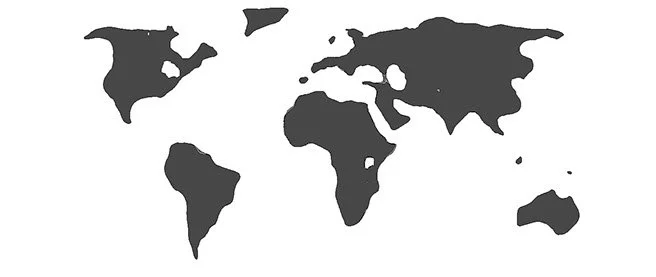 Black and white world map silhouette with continents in black.