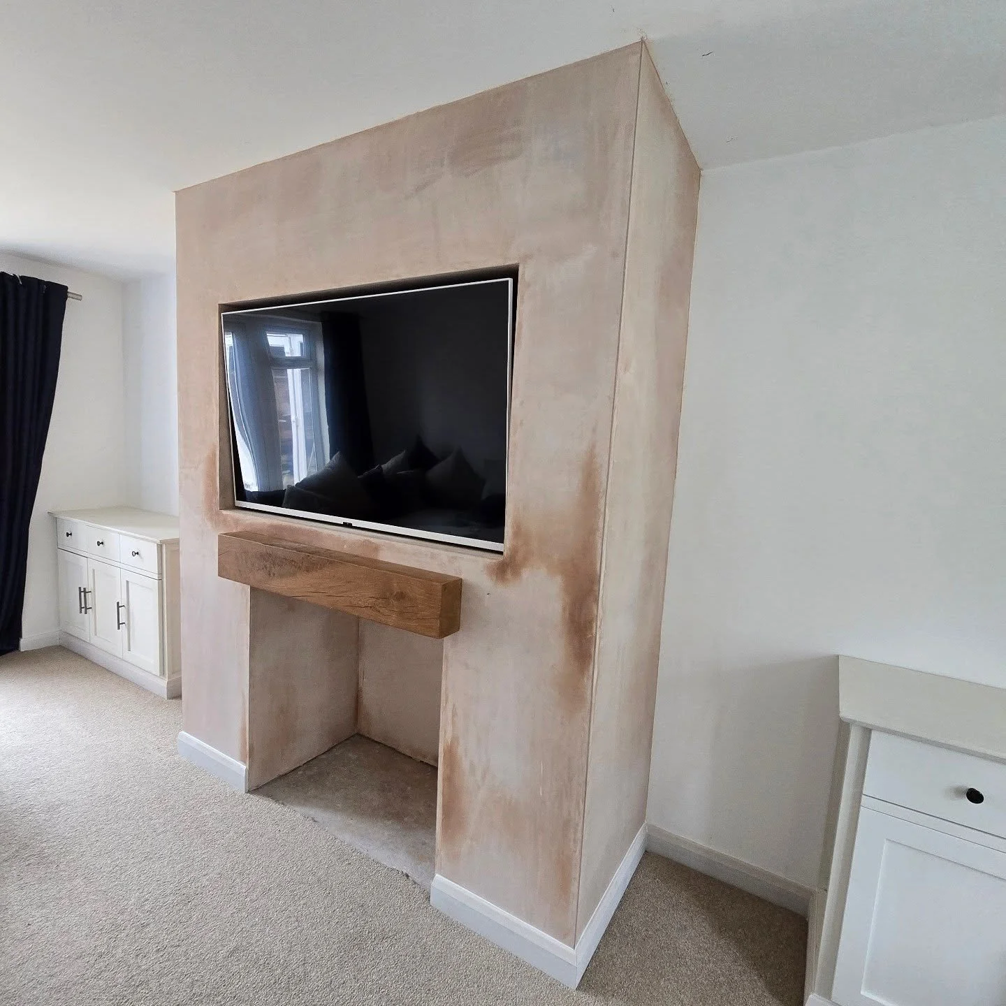 Just completed this Fireplace/Media Wall today and the customer absolutely loves it! Not only that but I have fixed her existing cabinets to either side adding filler peices and wrapping the whole thing with skirting board to give it that built in fi