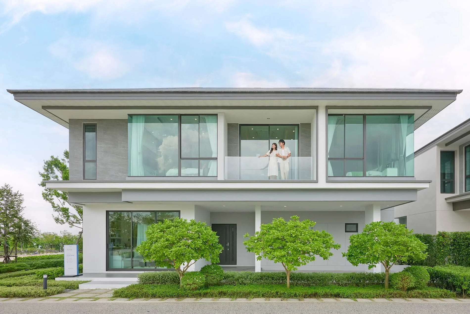 Modern two-storey luxury home at Avian Srinakarin Krungthep Kreetha with private balcony and landscaped garden.
