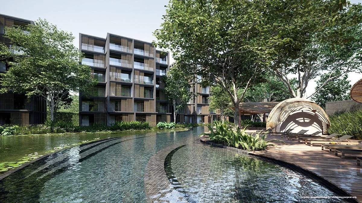 Lagoon pool surrounded by tropical landscaping at MGallery Residences MontAzure.