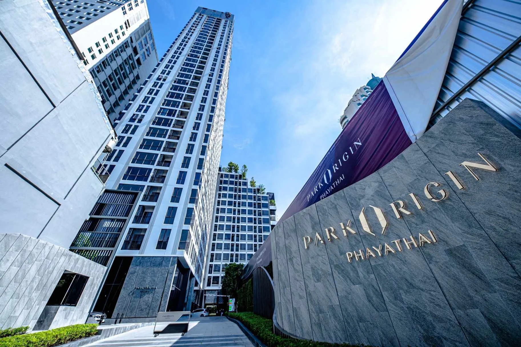 Park Origin Phayathai condominium exterior entrance and tower in central Bangkok.