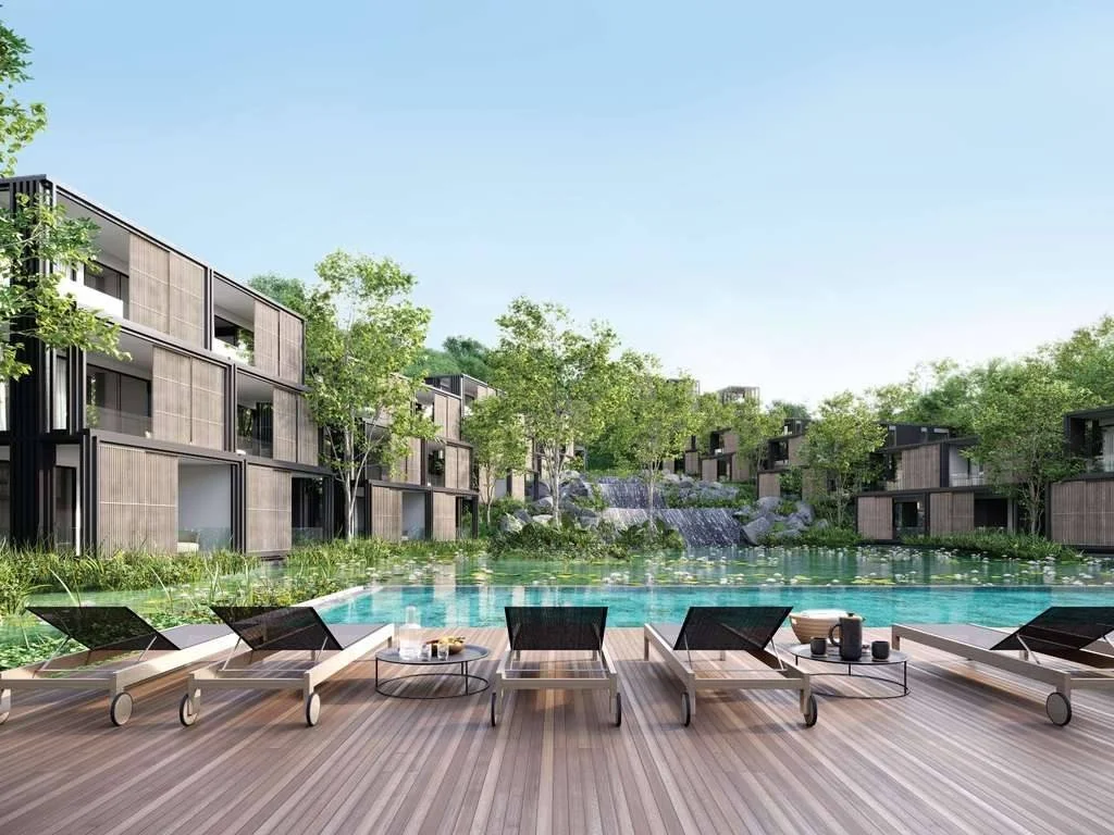 Central lagoon-style swimming pool and sun deck at MGallery Residences MontAzure.