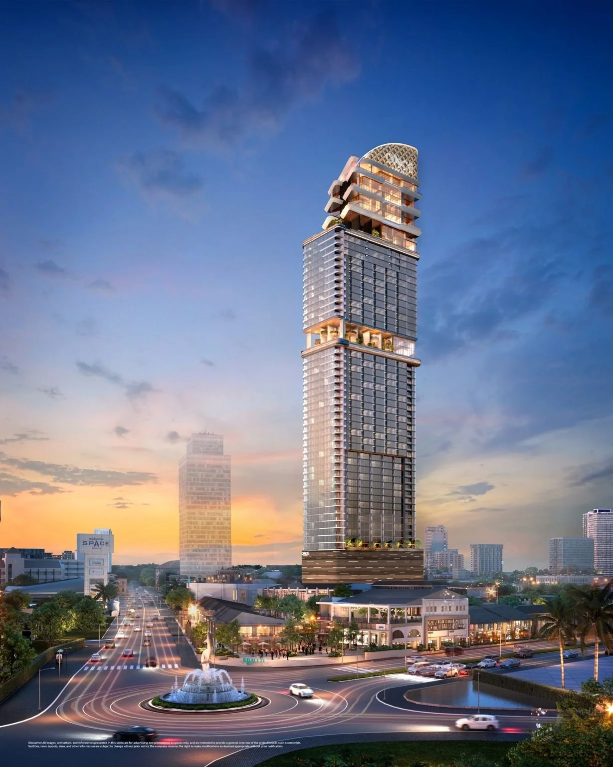 Once Wongamat exterior tower view from street level at dusk.