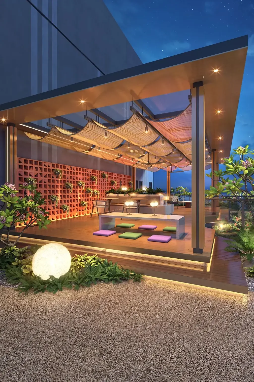 Outdoor lounge pavilion at Lofthill Residence in the evening.