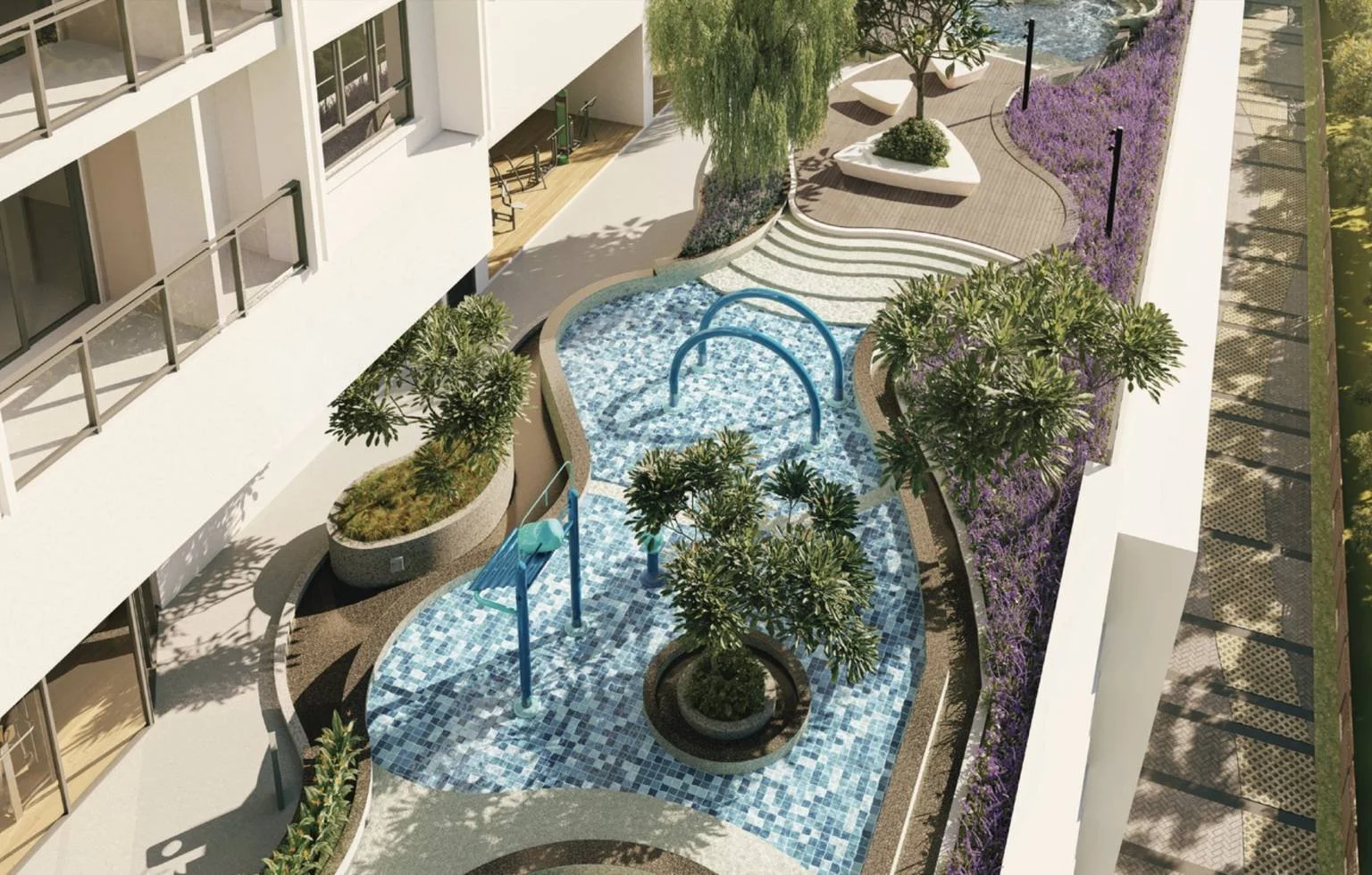 Wading pool at Waterstone Penang with landscaped deck, seating areas and greenery.