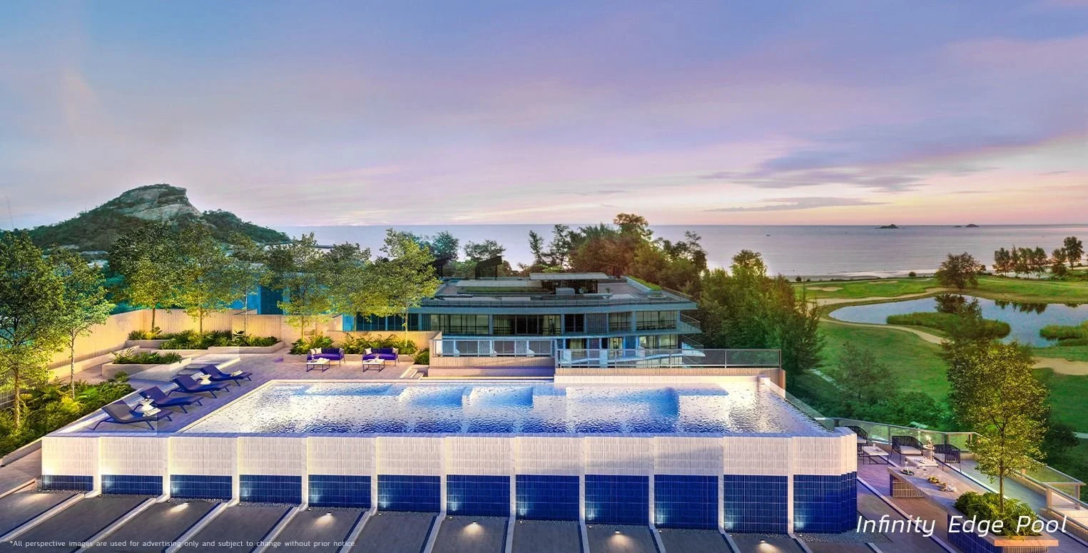 Infinity-edge pool at SASA Hua Hin overlooking the sea and coastline.