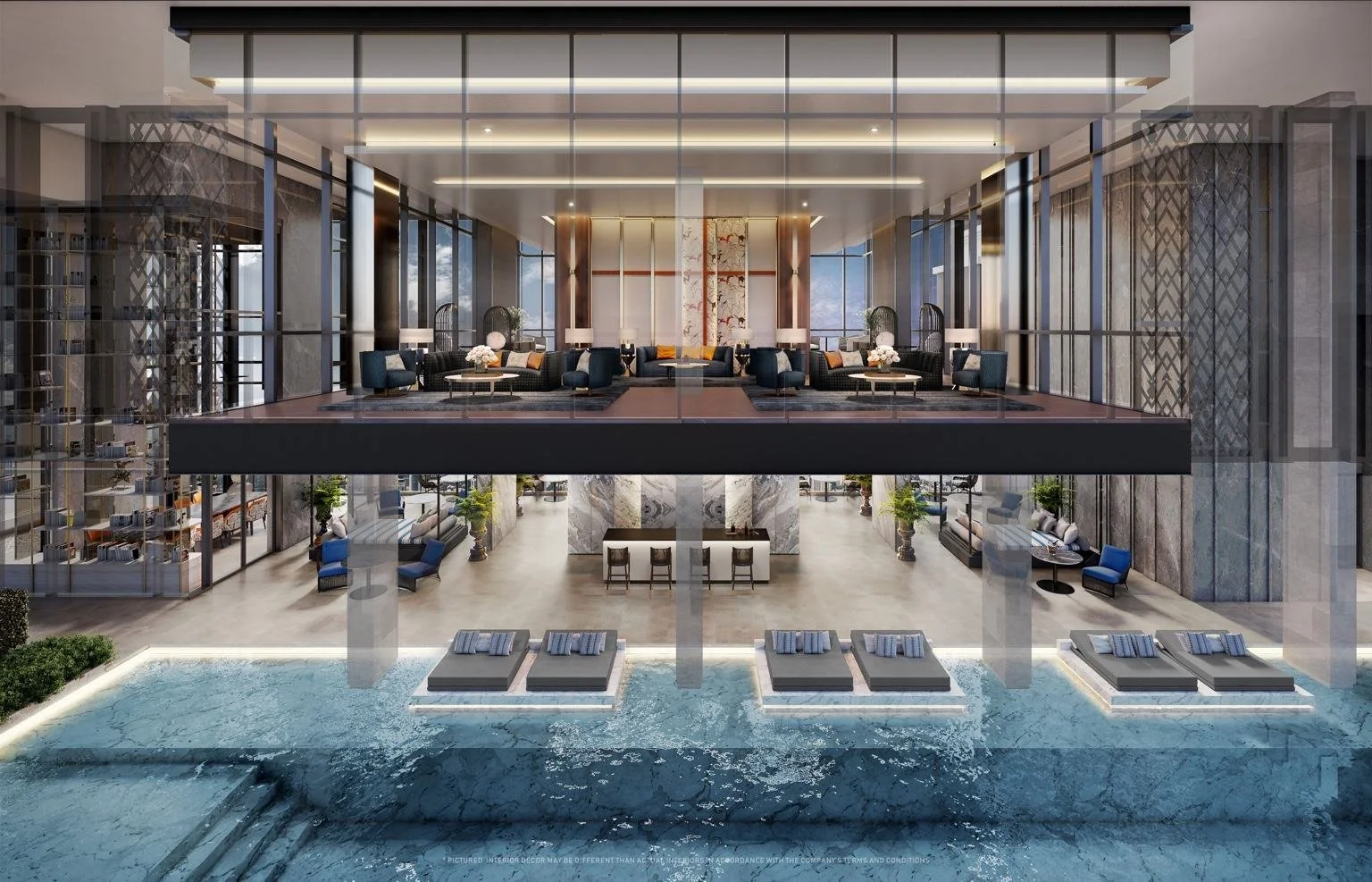 Sky Chamber pool lounge at The Address Siam–Ratchathewi with floating daybeds, double-height space and skyline backdrop.