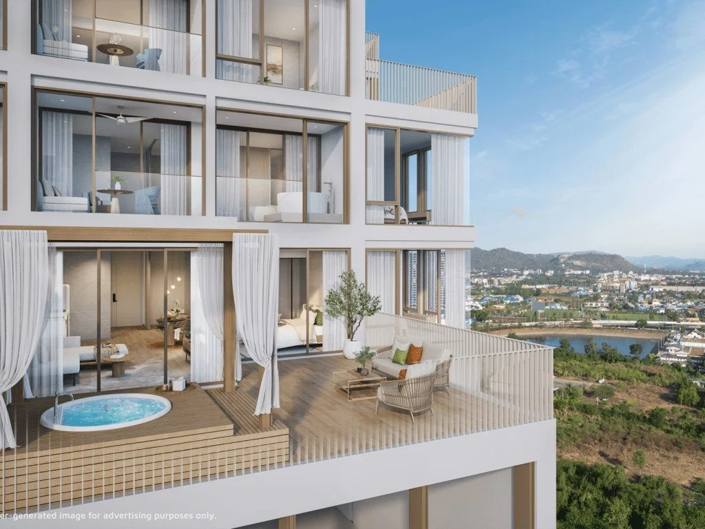 Penthouse balcony at Vehha Hua Hin with private jacuzzi and elevated city and mountain views in Hua Hin, Thailand.