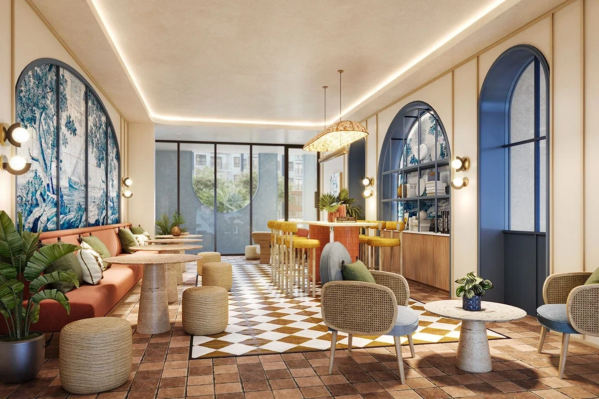 The Living Room co-working lounge at Cabanas Hua Hin with Portuguese-inspired décor and communal seating.