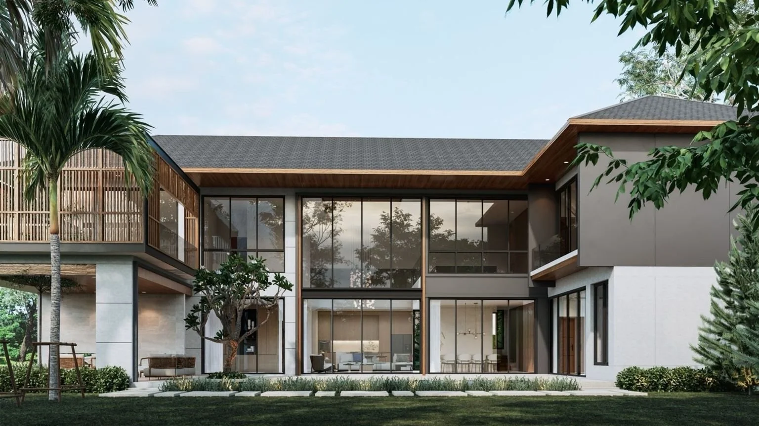 Exterior garden view of Mouana Grande villa in Chalong Bay, Phuket surrounded by tropical greenery.