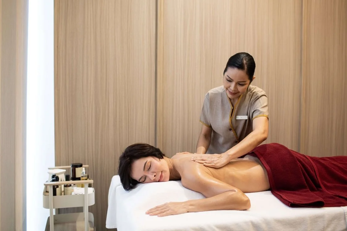 Luxury spa massage service at Coco Parc Bangkok, offering wellness and relaxation in a serene treatment room.