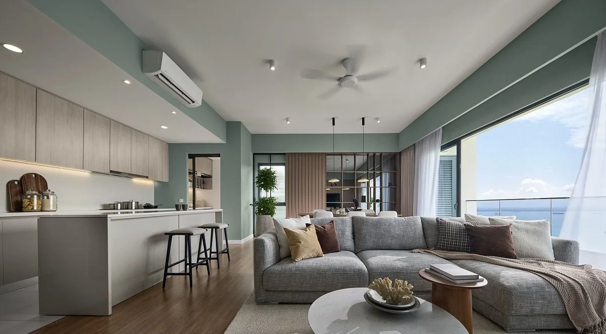 Open-plan living, dining and kitchen area with sea views at Maris.