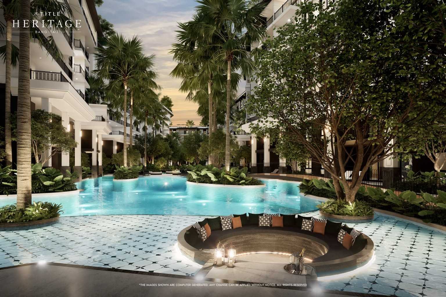 Lagoon-style pool with circular sunken seating and palm landscaping at The Title Heritage Bang Tao.