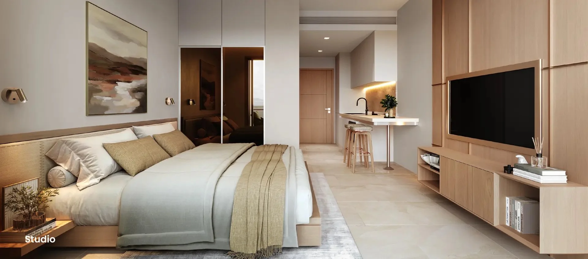Stylish studio unit at Siamese Bangtao featuring integrated living, kitchen, and sleeping areas with modern wood accents