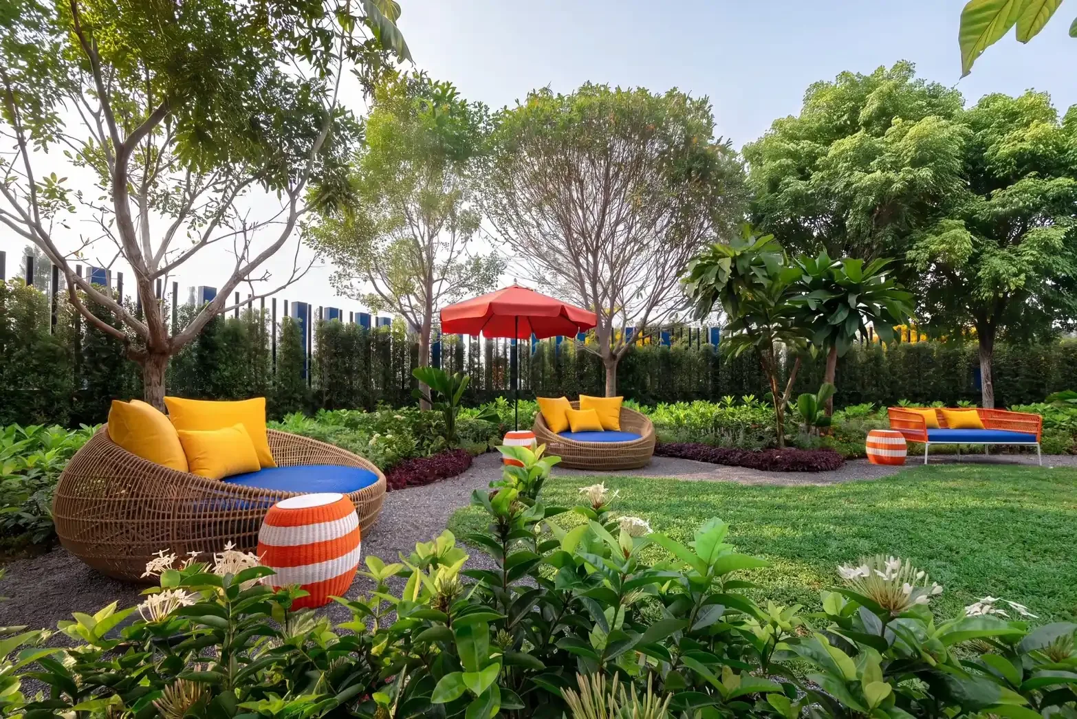 Landscaped garden and outdoor seating area at Hub Hua Hin.