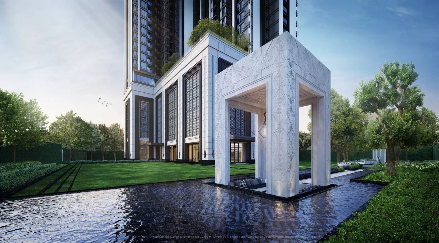 River Sala garden court at The Address Siam–Ratchathewi with landscaped greenery, water features and tranquil seating areas.