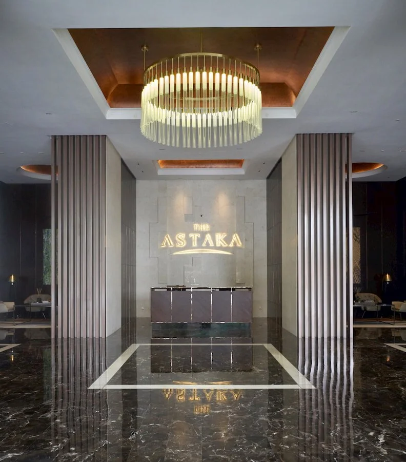 Lobby area at The Astaka Johor Bahru, with marble floors and luxury ambient lighting.