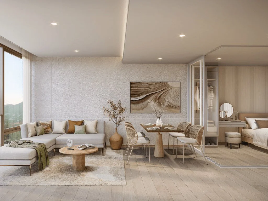 Living and dining area at Vehha Hua Hin with mountain views and floor-to-ceiling windows in Hua Hin, Thailand.