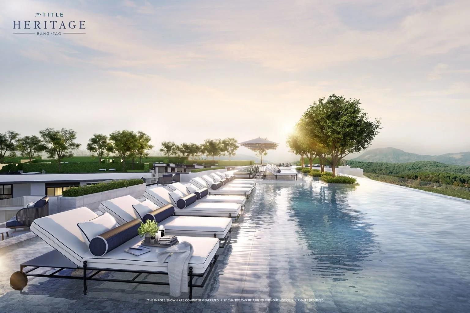Rooftop sky pool with sun loungers and mountain views at The Title Heritage Bang Tao, Phuket.