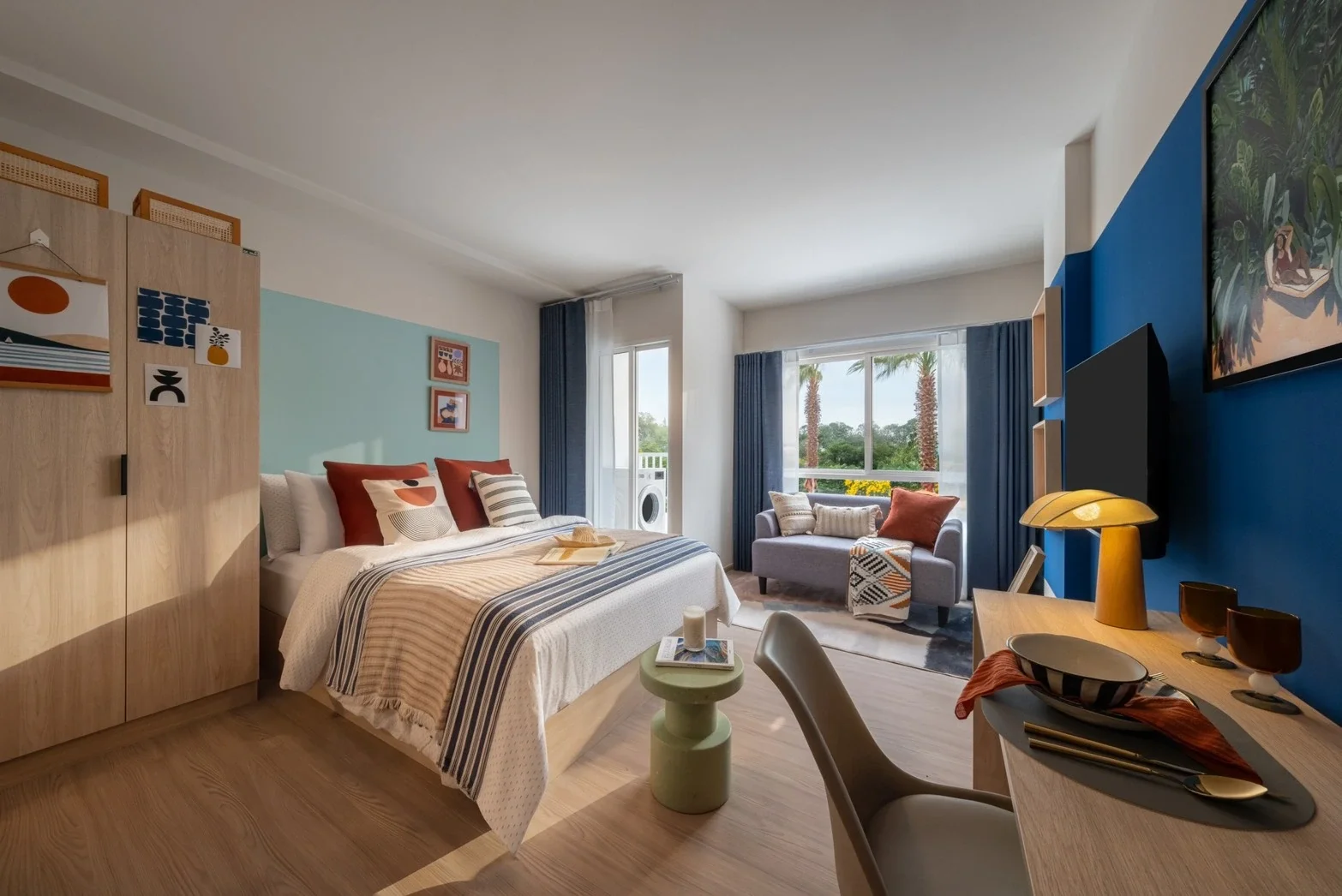 Studio condominium bedroom at Hub Hua Hin with contemporary interiors and garden views.