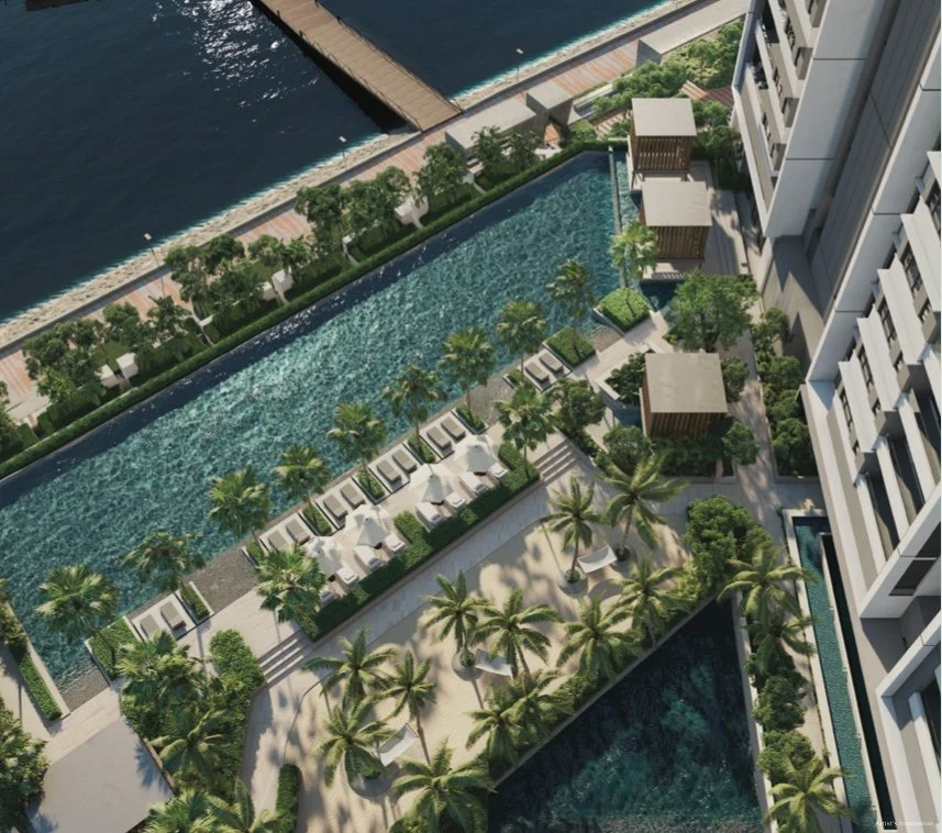 Aerial view of Maris pool deck, landscaped gardens and waterfront promenade.