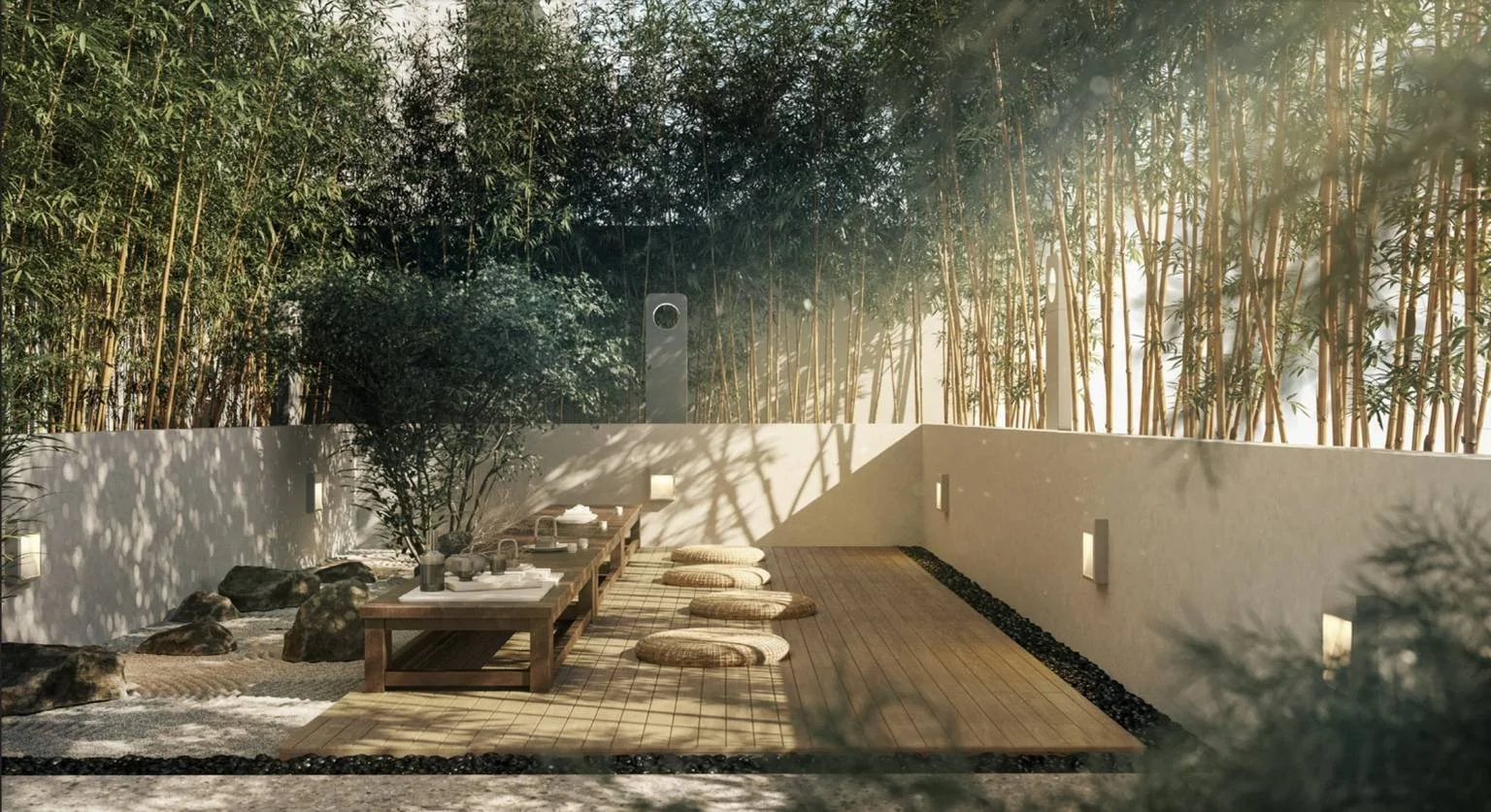 Tea garden relaxation area at Waterstone Penang with timber decking, bamboo landscaping and tranquil seating.