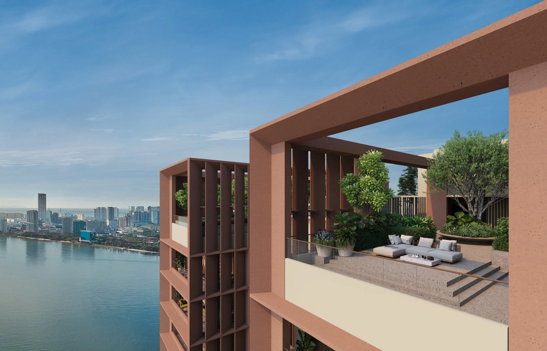 Sky terrace at The Lume by E&O with private outdoor seating, landscaped greenery and sea views across Penang.