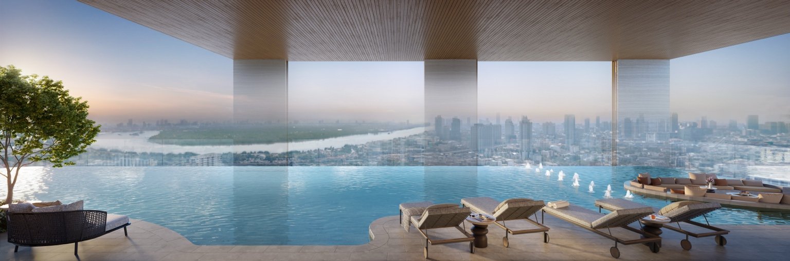 Infinity-edge swimming pool at Widen by Sansiri overlooking Bangkok skyline and river views.