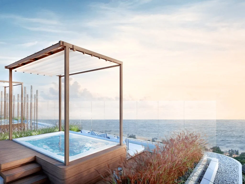 Rooftop jacuzzi at Vehha Hua Hin with sea views and sunset setting in Hua Hin, Thailand.
