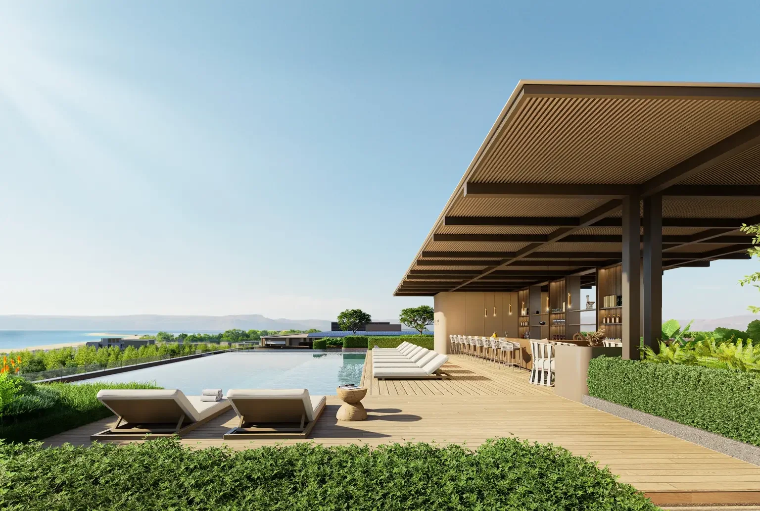 Rooftop swimming pool and sun deck at The Zero Nai Yang condominium, Phuket.