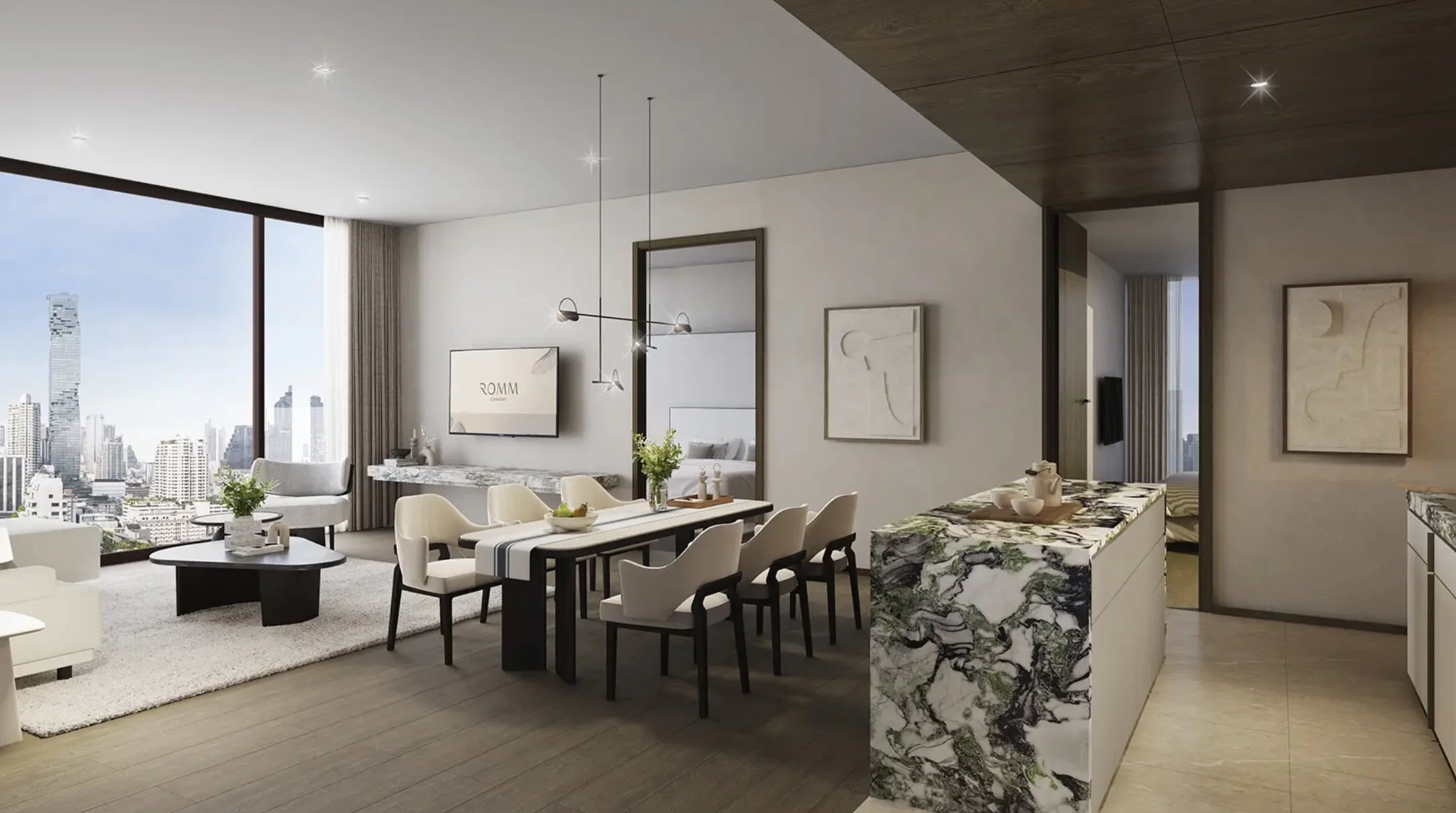 Open-plan dining and living area at ROMM Convent with skyline views and premium marble finishes.