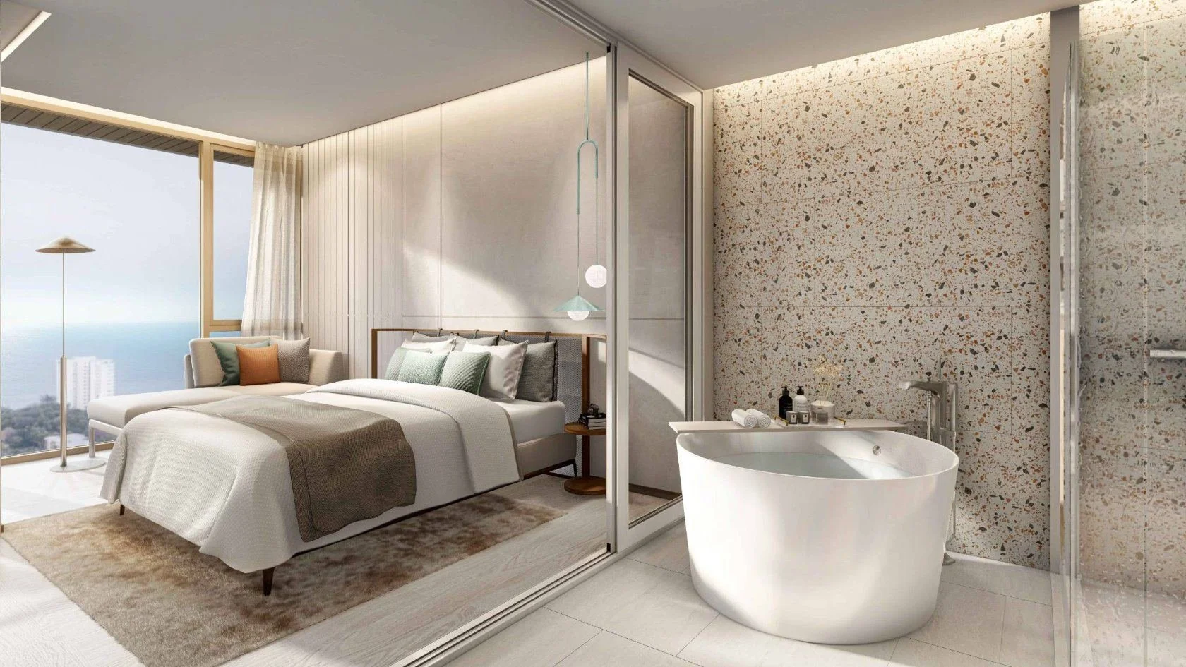 Bedroom and bathroom interior at Vehha Hua Hin with freestanding bath and sea view in Hua Hin, Thailand.
