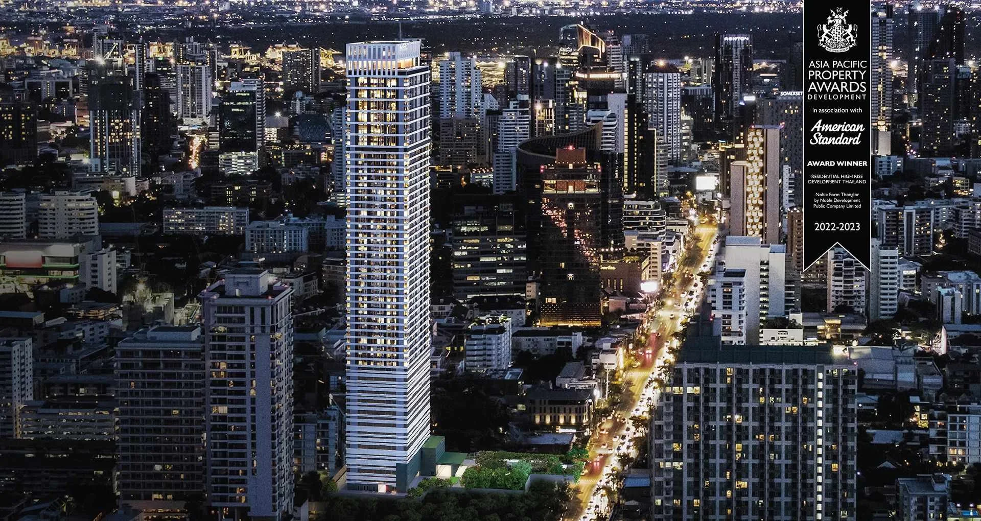 Noble Form Thonglor condominium tower in Bangkok at night with city skyline and Asia Pacific Property Awards banner.