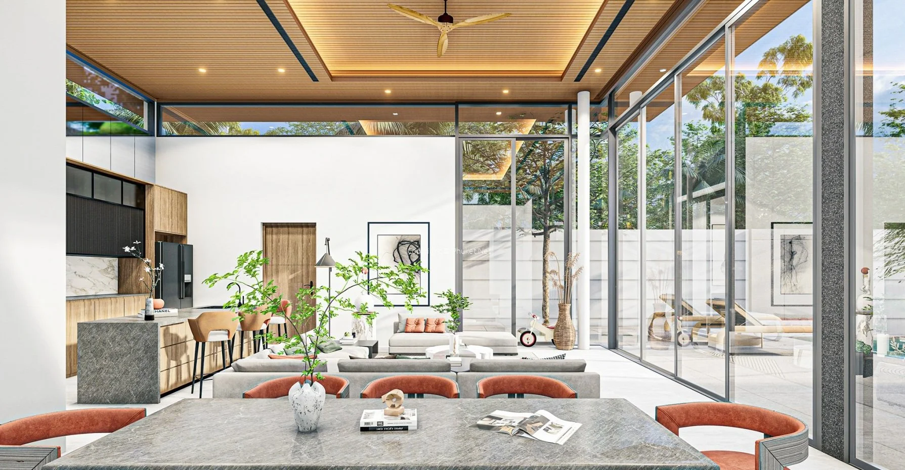 Mouana Serenity Cherngtalay villa dining area with the open plan lounge and kitch area in the background