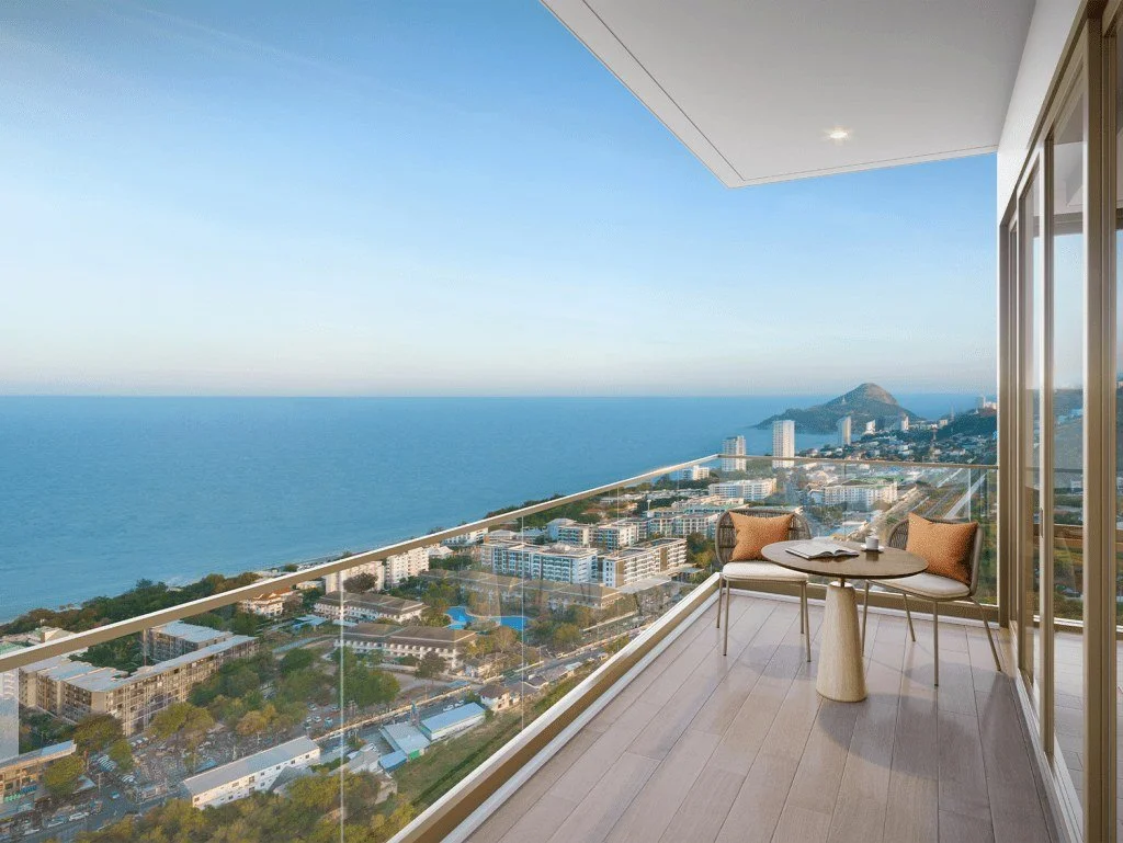Balcony sea view from a condo at Vehha Hua Hin overlooking the coastline and Khao Takiab in Hua Hin, Thailand.