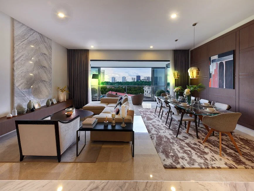 Living and dining area at The Astaka Johor Bahru opening onto a balcony.