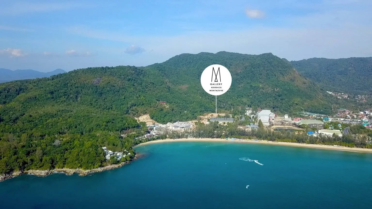 Aerial view of MGallery Residences MontAzure overlooking Kamala Beach and the Andaman Sea.