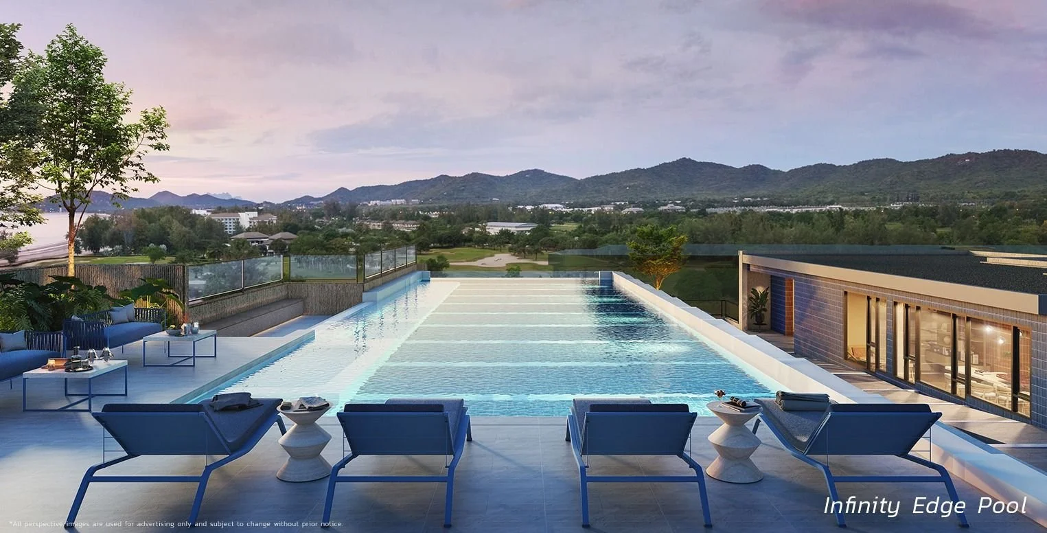 Rooftop infinity-edge pool at SASA Hua Hin with panoramic mountain views.
