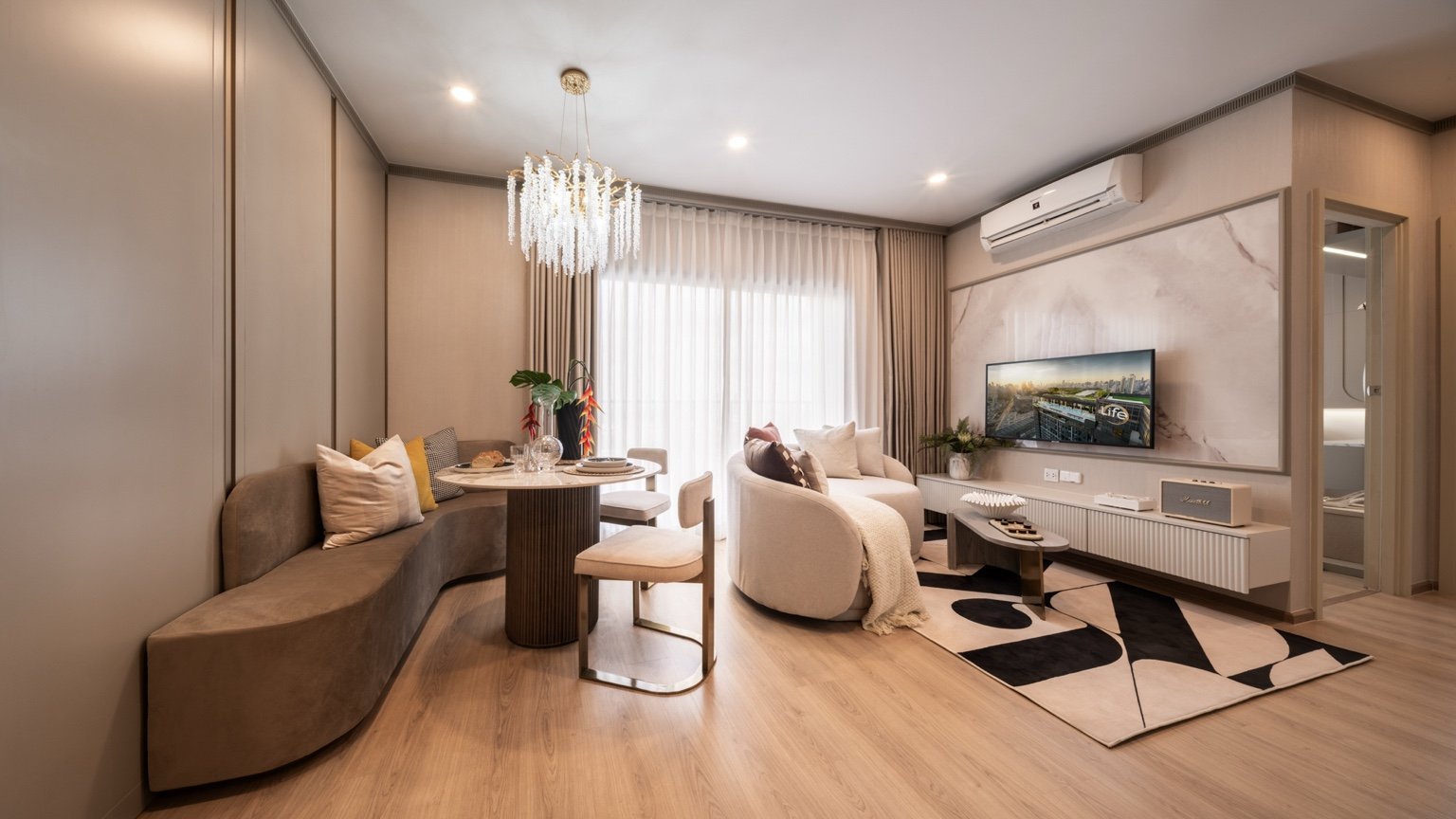 2 bedroom unit living room at Life Rama 4 Asoke with open-plan dining and lounge area.