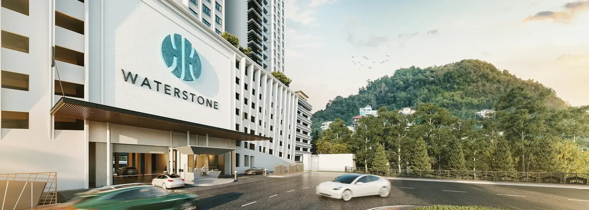 Waterstone Penang entrance and drop-off area with main façade, hillside backdrop and gated residential access in Tanjung Bungah.