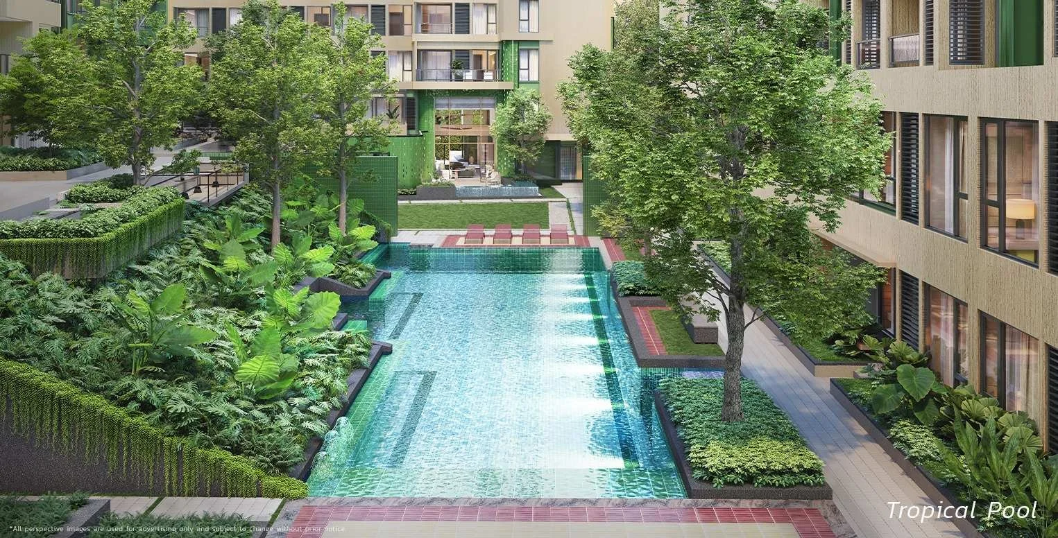 Tropical swimming pool surrounded by landscaped gardens at SASA Hua Hin.
