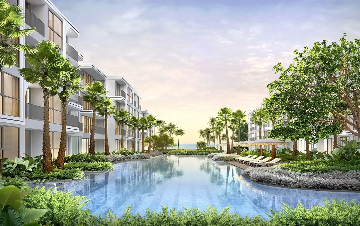 Resort-style swimming pool surrounded by residences and tropical gardens at The Standard Residences Hua Hin.