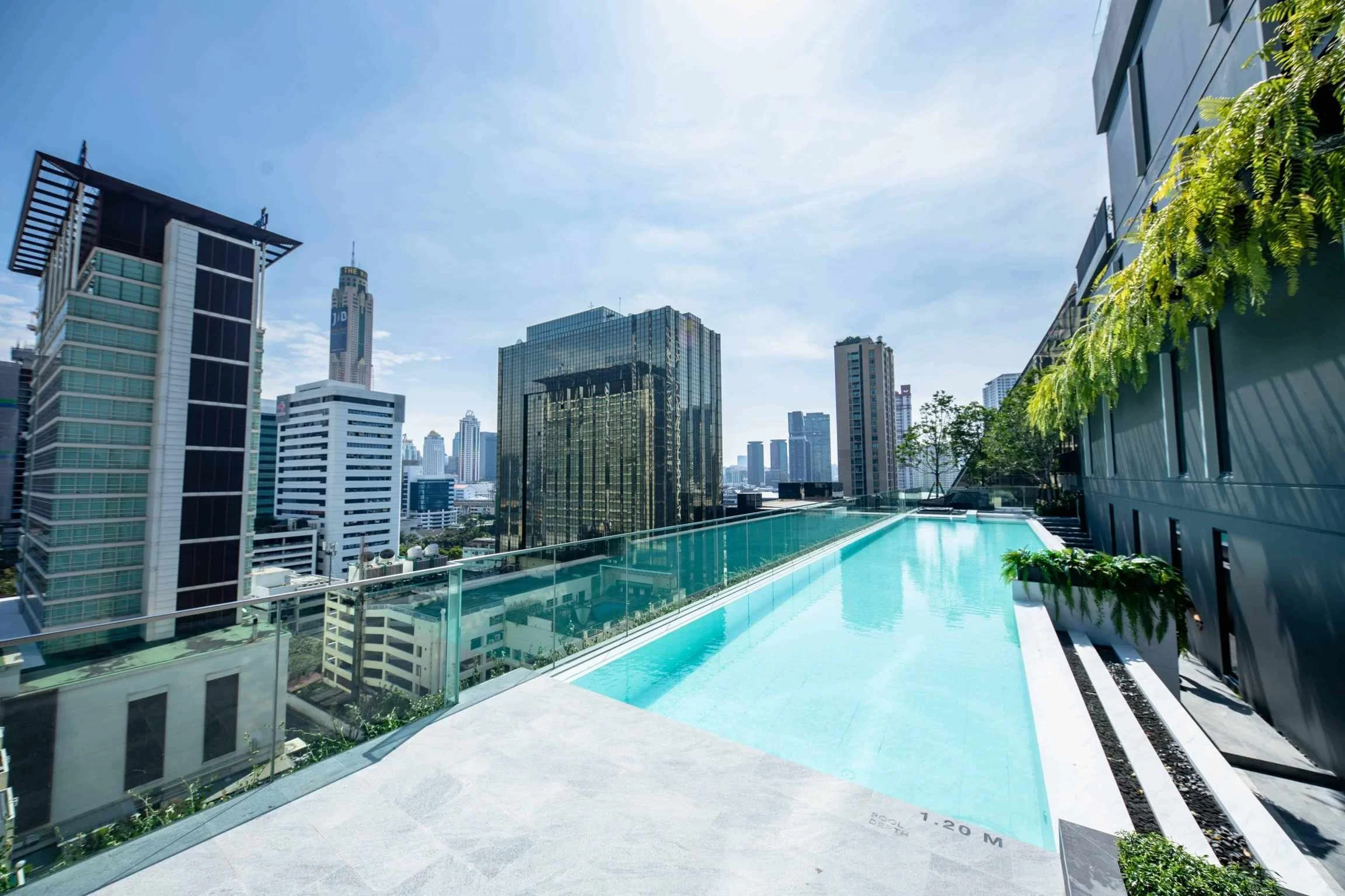 Rooftop infinity pool with Bangkok skyline views at Park Origin Phayathai.