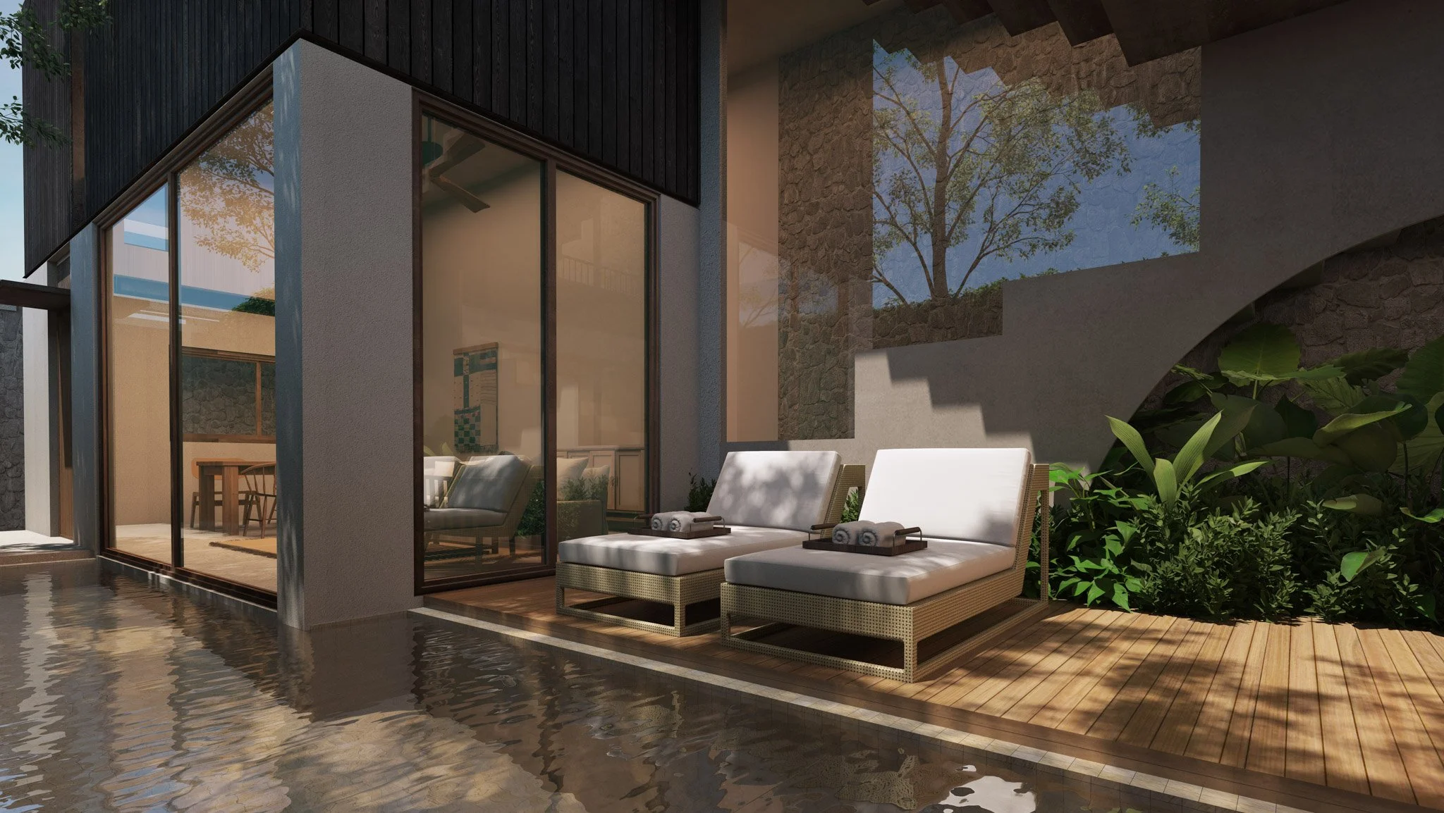 Private pool deck and sun loungers outside the Pine villa at Villa Qabalah, featuring tropical landscaping and modern architecture