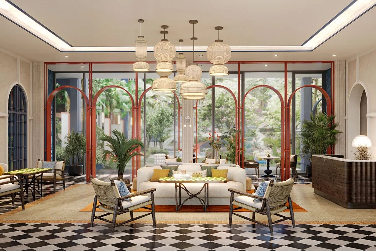 Portuguese-inspired lobby lounge at Cabanas Hua Hin with arched detailing and contemporary seating.