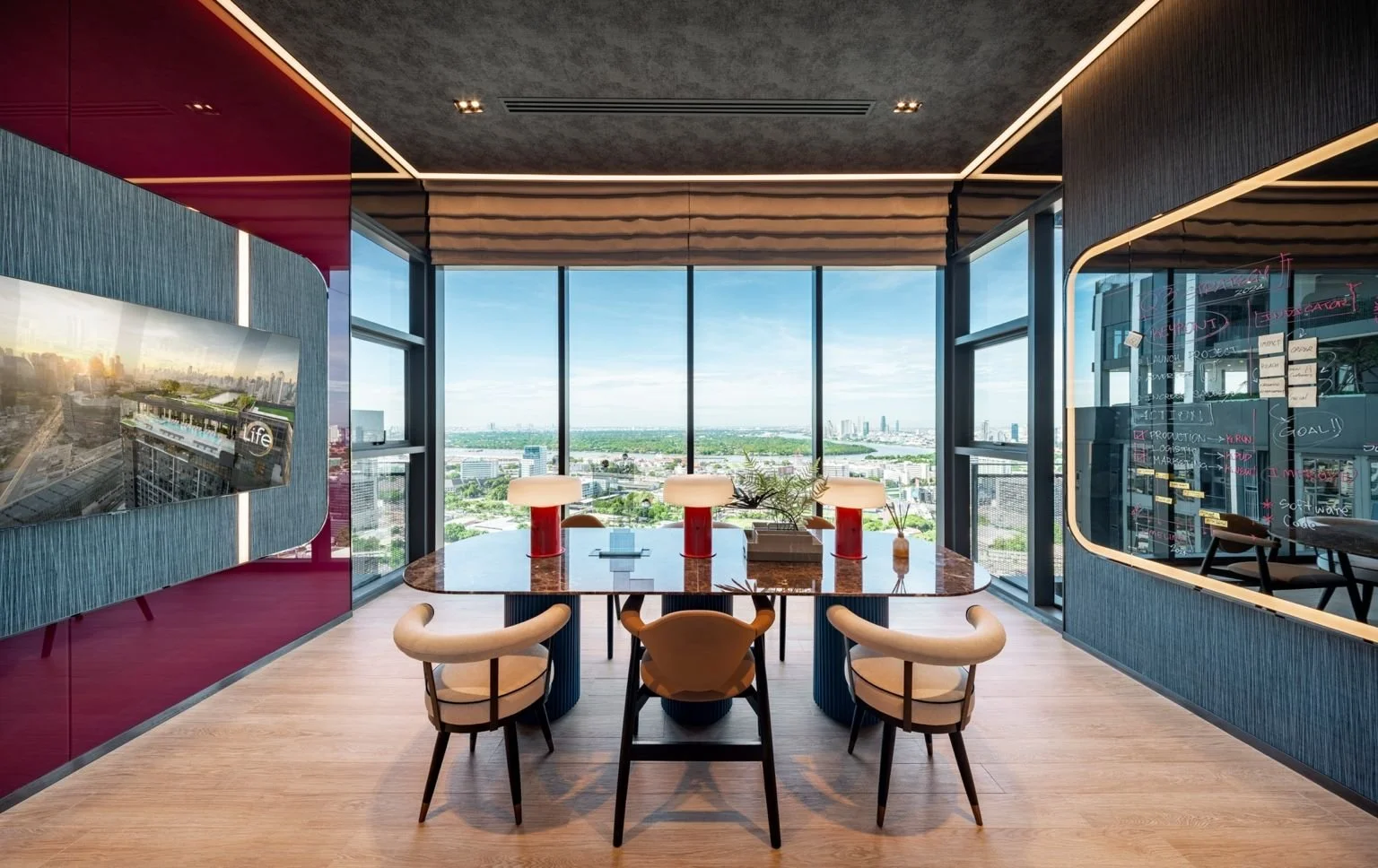 Sky studio co-working space at Life Rama 4 Asoke with city views and meeting area.