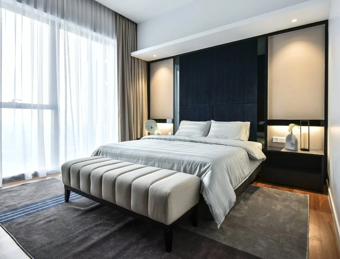 Master bedroom interior at The Astaka Johor Bahru with full-height windows and contemporary finishes.