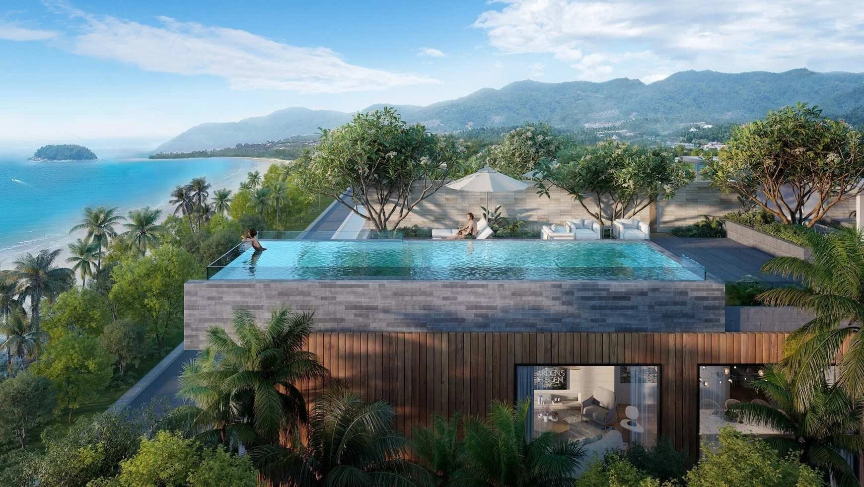 Elevated terrace and infinity pool at Gardens of Eden Phuket overlooking Bang Tao coastline, framed by tropical greenery and modern architecture.