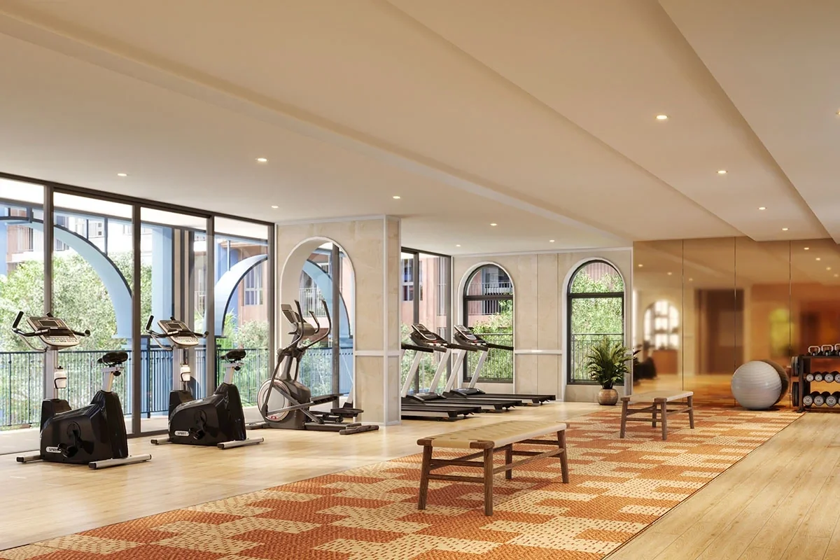 Fitness centre at Cabanas Hua Hin with treadmills, exercise bikes, weights and garden views.
